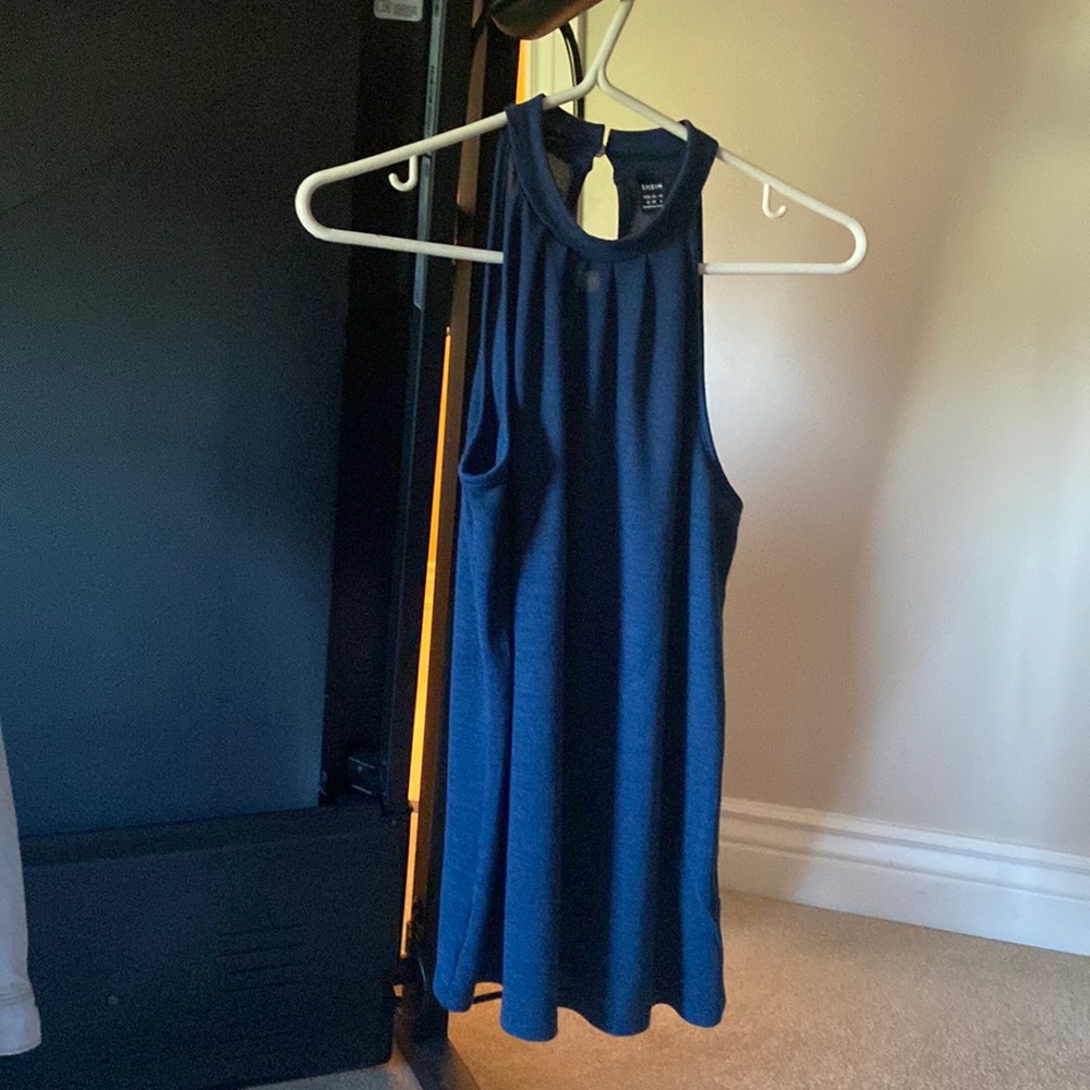 Shein blue tank top. Size medium or 6 Never worn